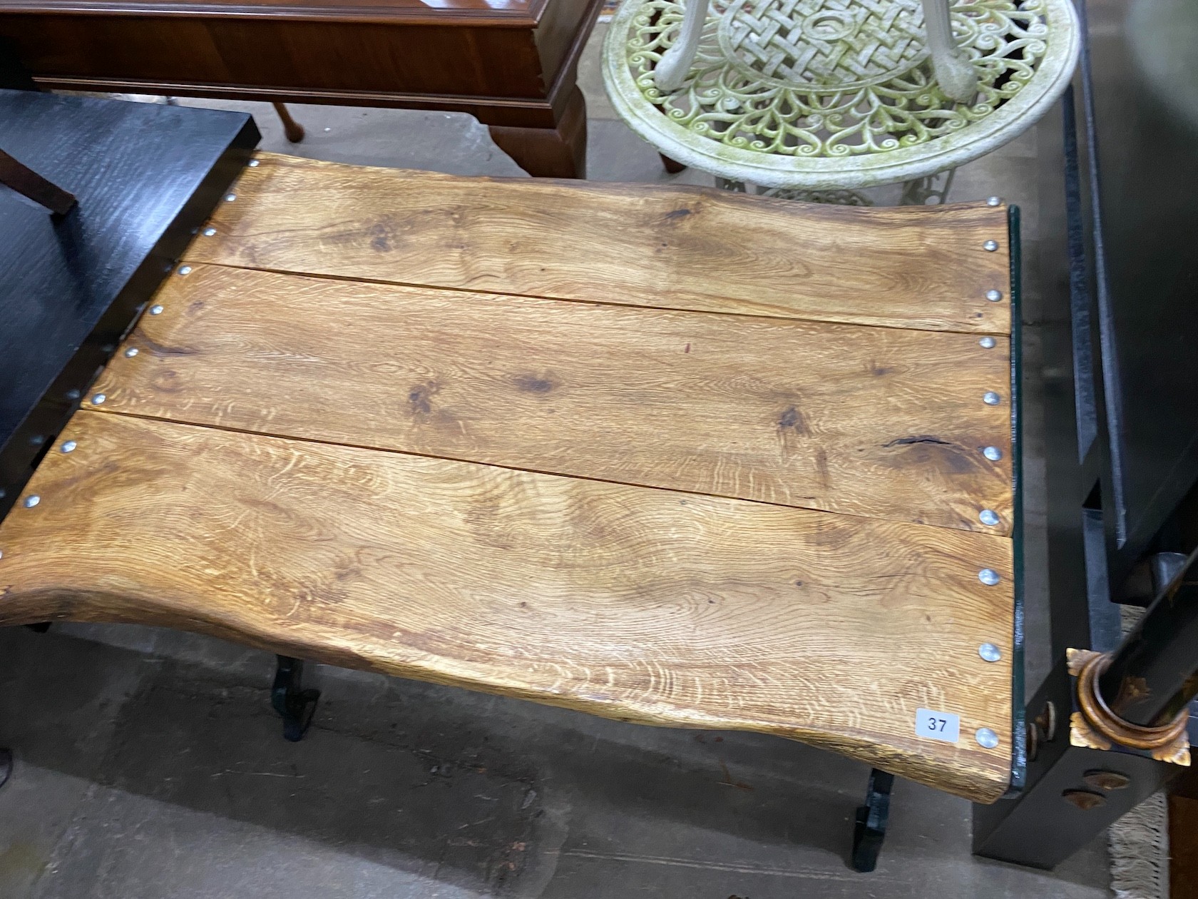 A Victorian style painted cast metal and oak rectangular garden table, width 100cm, height 67cm